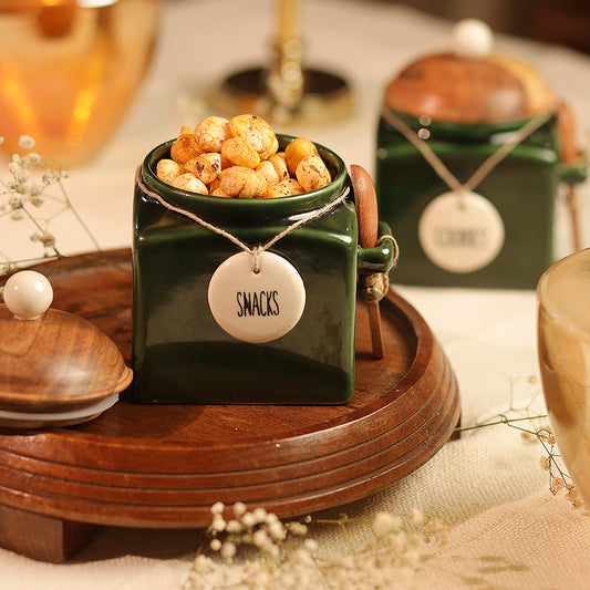 Glossy green snacks and cookies storage jar