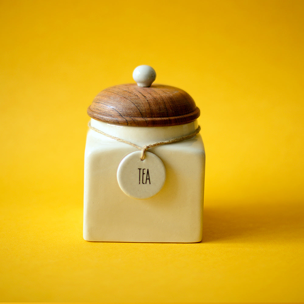 Tranquil White Ceramic Tea Storage Jar The Blooming Bagh